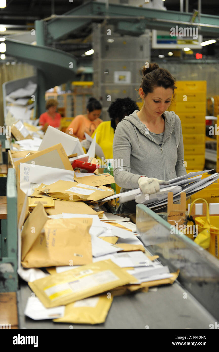 Employees in the mail center of Deutsche Post AG in the Arnulfstrasse in Munich. Stock Photo