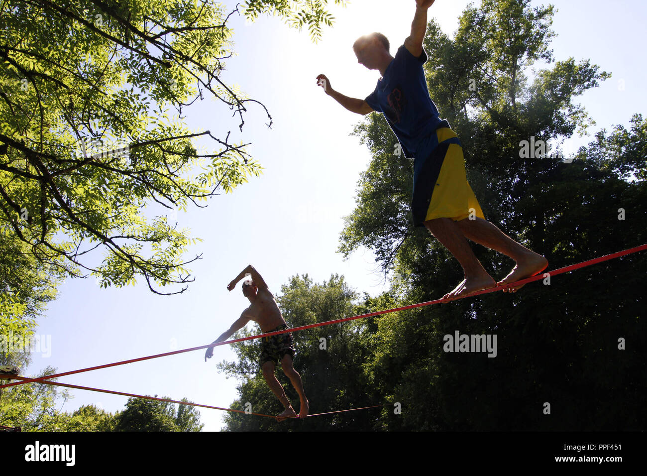 Slackliners hires stock photography and images Alamy