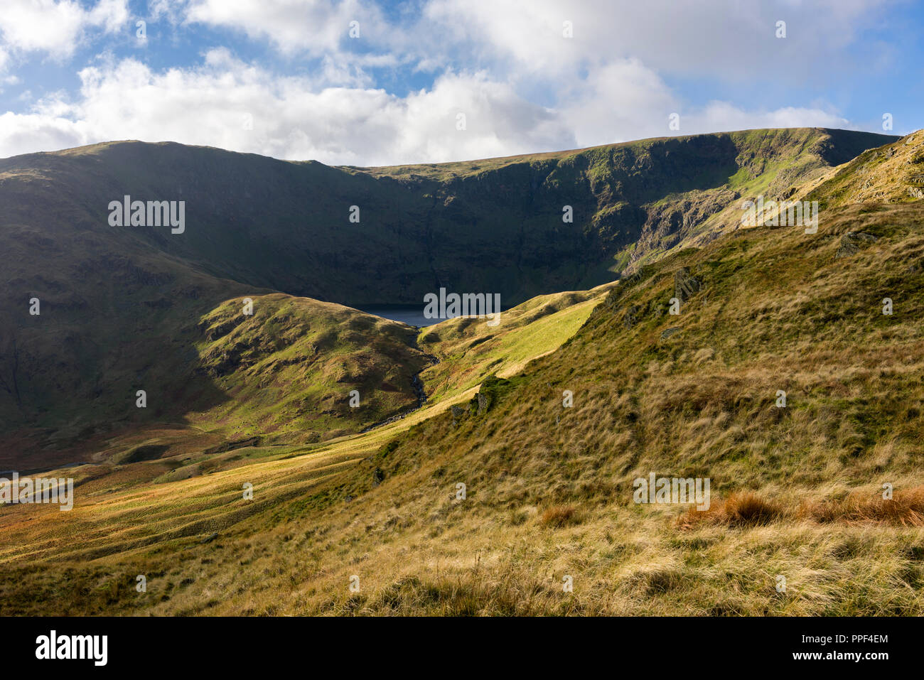 Mardale Ill Bell and High Street fells with Blea Water tarn below in the Lake District National Park, Cumbria, England. Stock Photo