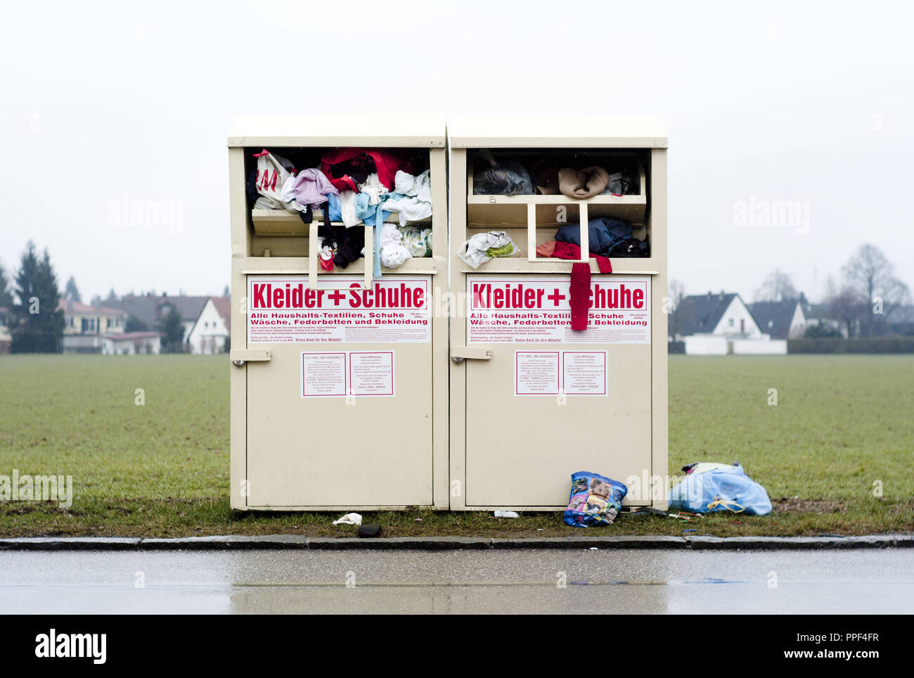 Collection bins for old clothes and shoes in Germering. Stock Photo
