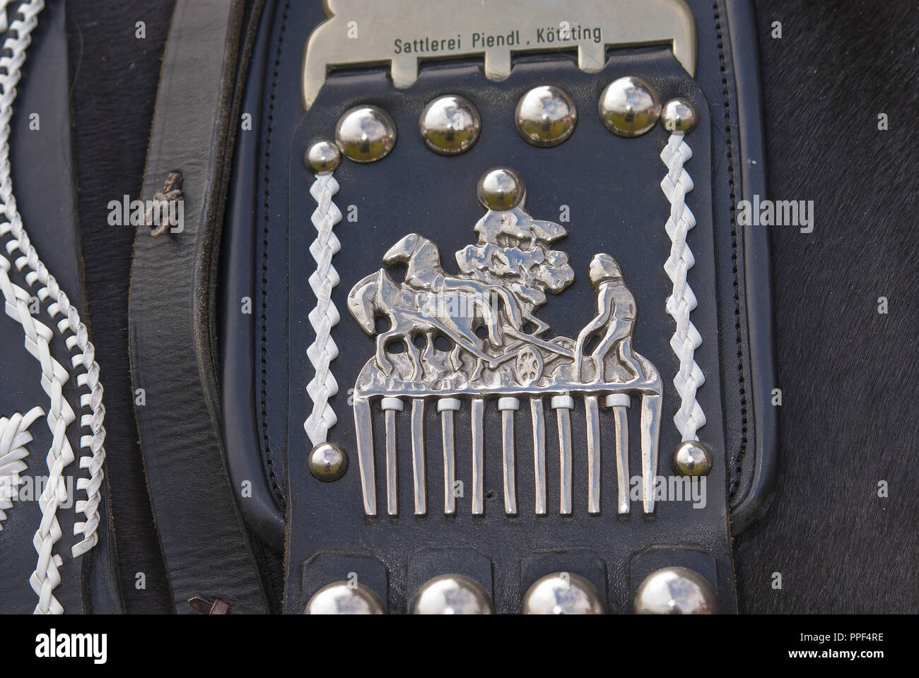 Detail of a harness at the traditional Leonhardiritt (St. Leonard's Ride) in Holzhausen - Teisendorf, Upper Bavaria. The procession where the beautifully decorated horses are blessed was first mentioned in 1612. Stock Photo