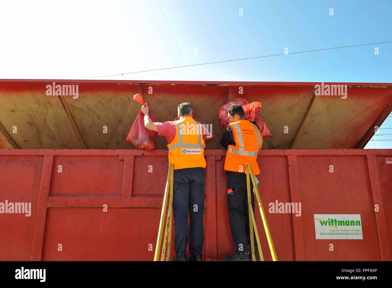 The cleaning personnel of Deutsche Bahn doing the daily cleaning of S