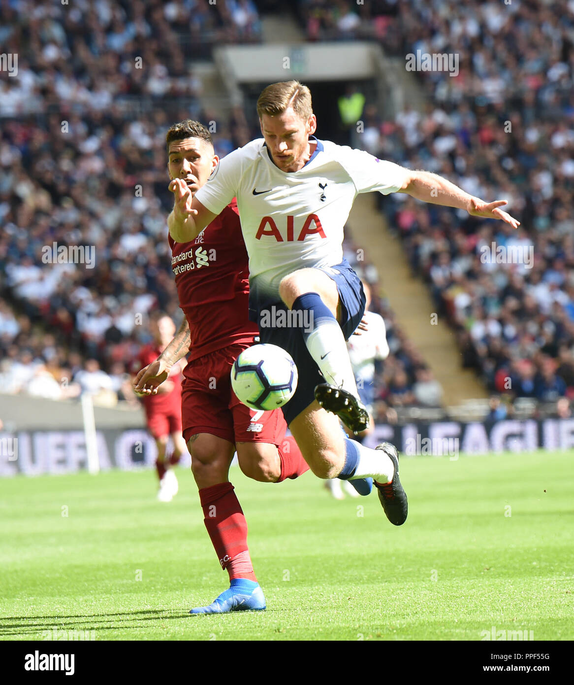 Jan Vertonghen of Spurs gets ahead of Roberto Firmino of Liverpool during the Premier League match between Tottenham Hotspur and Liverpool at Wembley Stadium , London , 15 Sept 2018 Editorial use only. No merchandising. For Football images FA and Premier League restrictions apply inc. no internet/mobile usage without FAPL license - for details contact Football Dataco Stock Photo