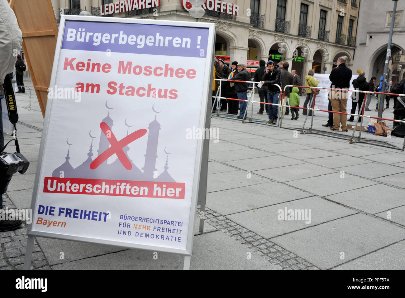 The anti-Islamic and xenophobic party 'Freedom' collects signatures at the Stachus for a citizens' initiative against the construction of a mosque in the city center of Munich. Stock Photo