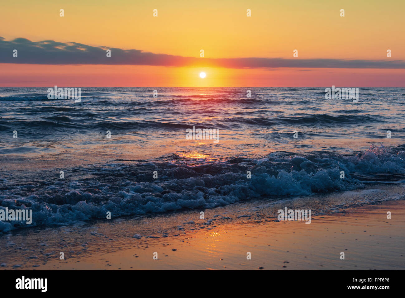Amazing beautiful sunrise at the sea Stock Photo - Alamy