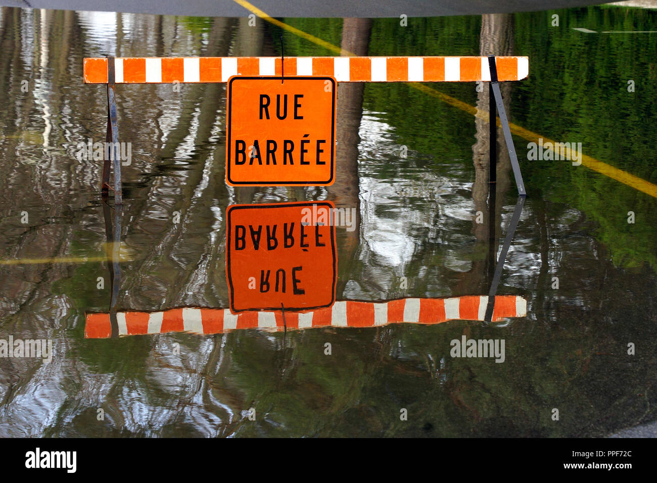 Laval,Canada,5 May,2017.Road block signs on street after a springtime flash flood.Credit:Mario Beauregard/Alamy Live News Stock Photo