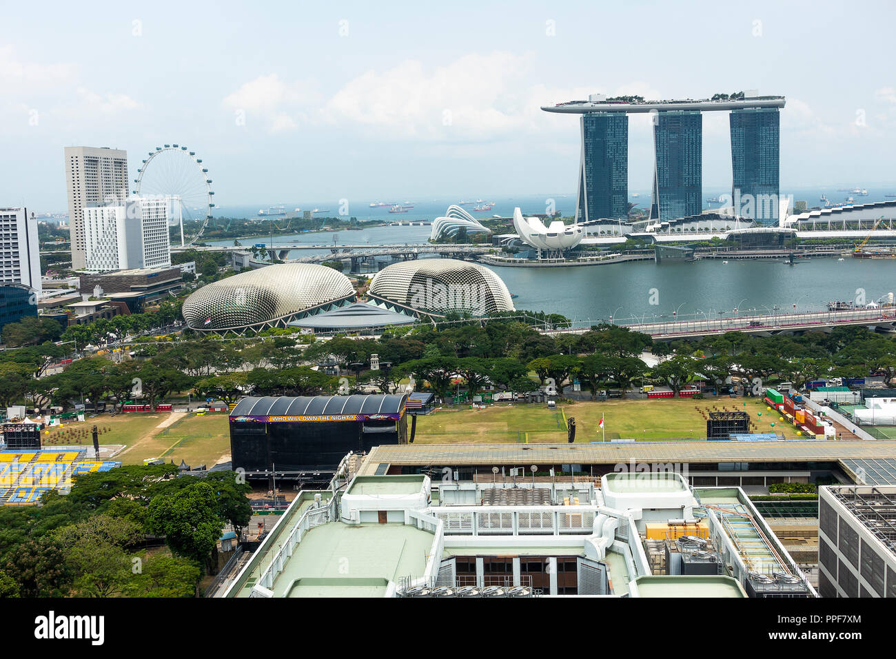 An Aerial View of The Padang with The Singapore Flyer, Marina Bay Sands Hotel, and The Esplanade Theatres in Republic of Singapore Asia Stock Photo