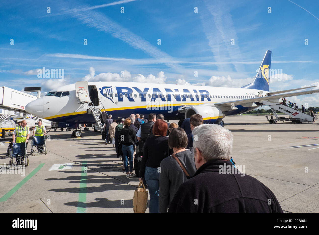 wheelchair,service,assistance,Passengers,boarding,Ryanair,flight,to