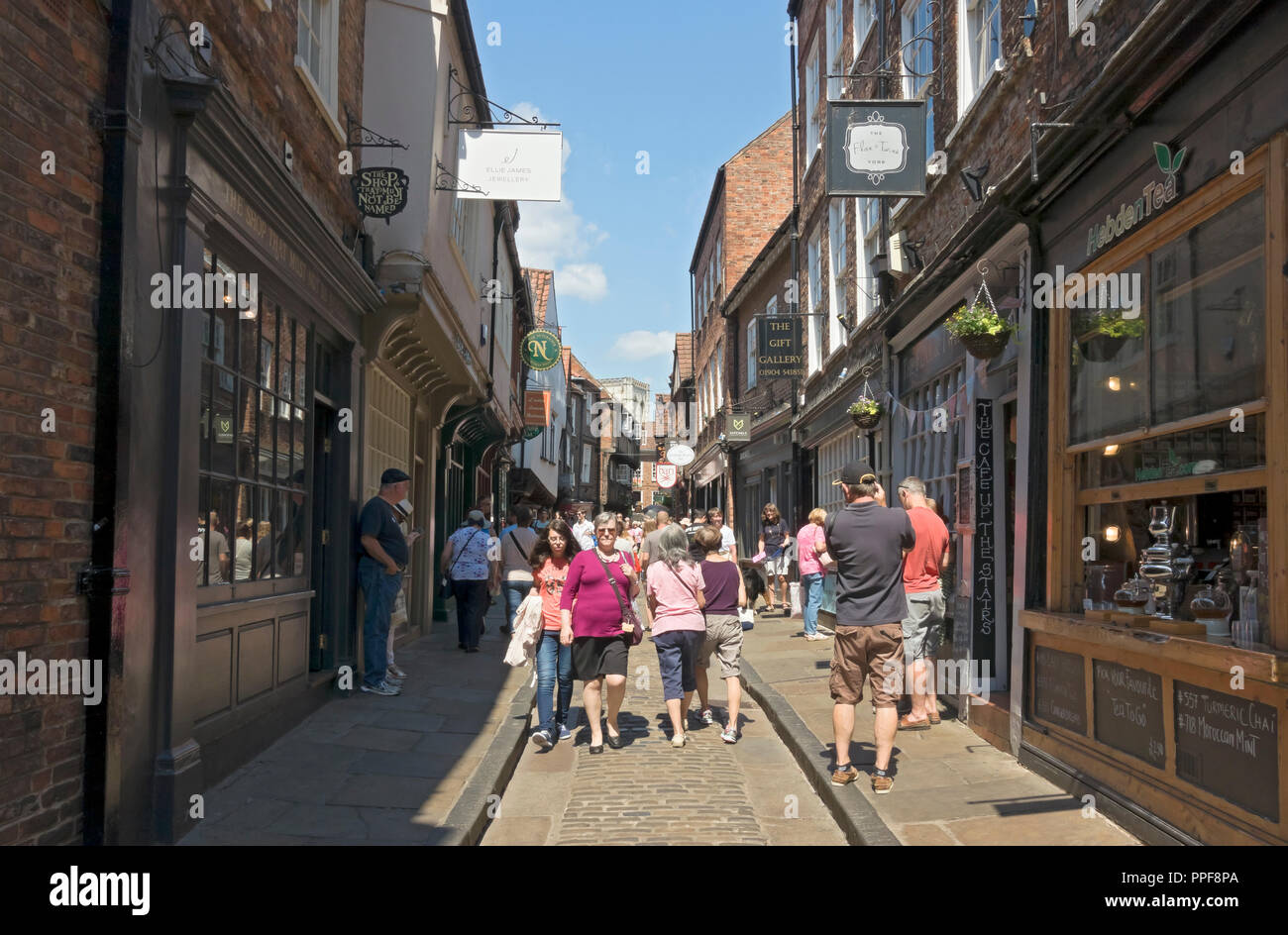 York city town centre people visitors tourists visiting The Shambles in summer York North Yorkshire England UK United Kingdom GB Great Britain Stock Photo