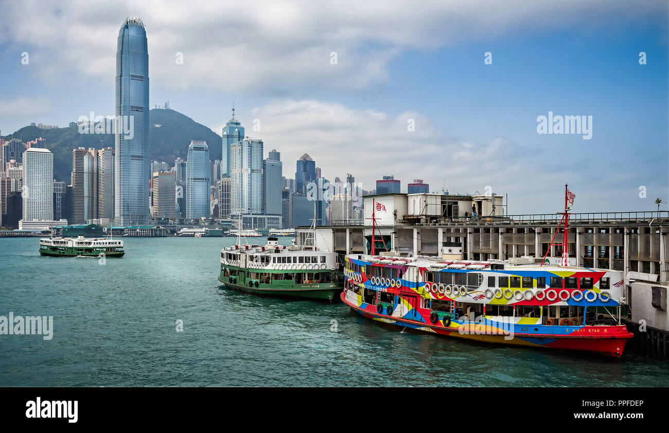 Hong Kong Island cityscape from Kowloon with ferries at pier taken in Hong Kong, China on 22 March 2012 Stock Photo