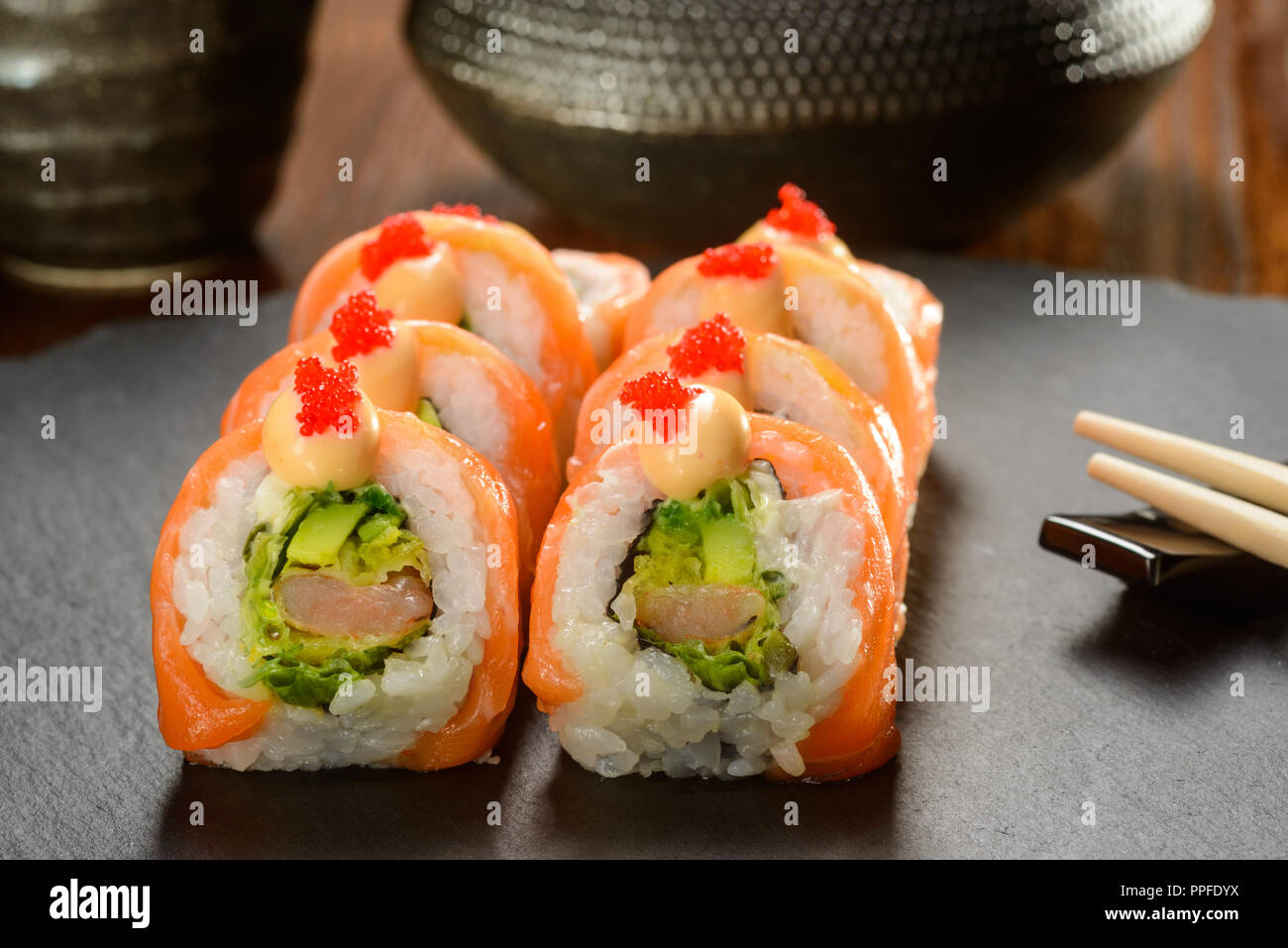 Salmon and avocado sushi rolls Stock Photo Alamy