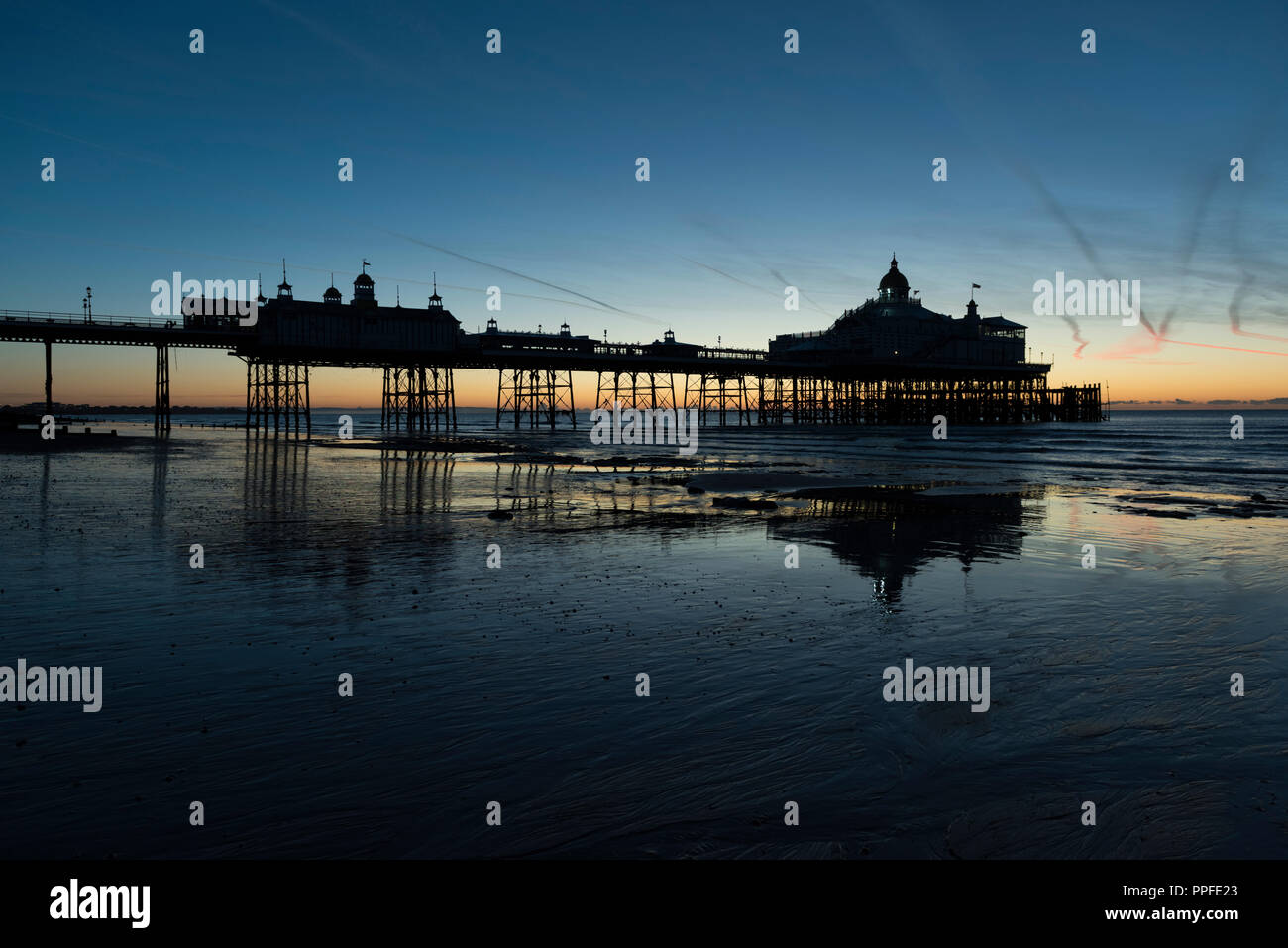 Early morning at Eastbourne Pier, in the county of East Sussex, on the south coast of England in the UK. Stock Photo