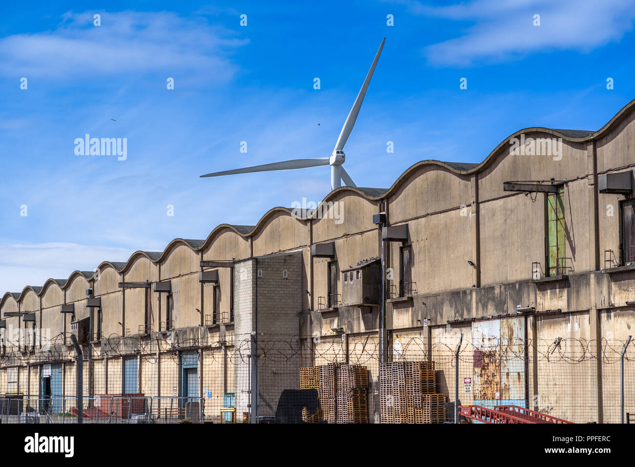 Curved roof warehouses along  Huskisson Dock, Liverpool, Merseyside, Uk. Stock Photo