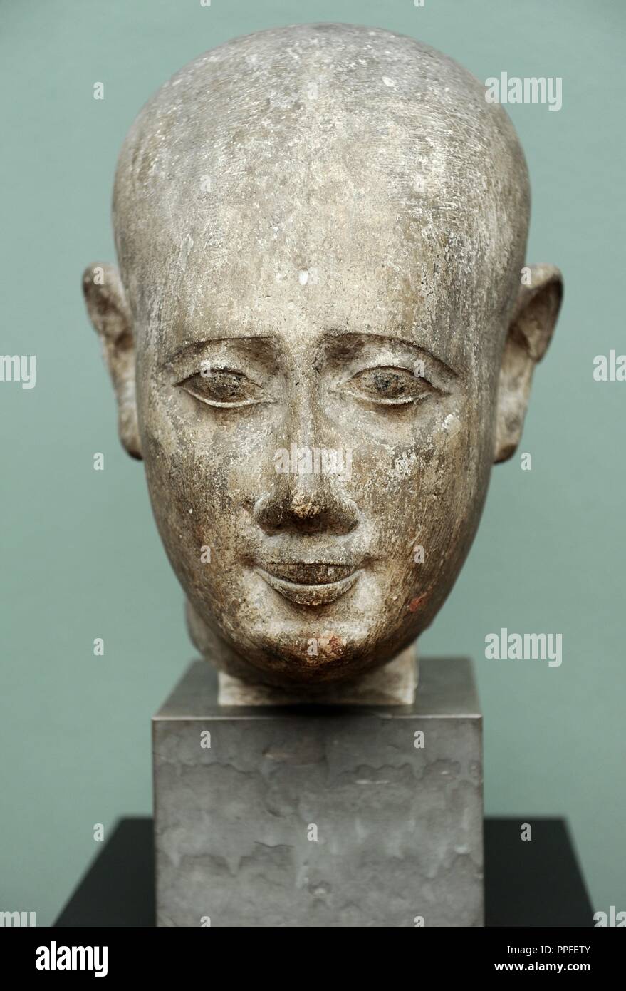 Head from a male statue. Limestone. Ptolemaic Period. 3rd century BC. Origin unknown. Ny Carlsberg Glyptotek. Copenhagen. Denmark. Stock Photo