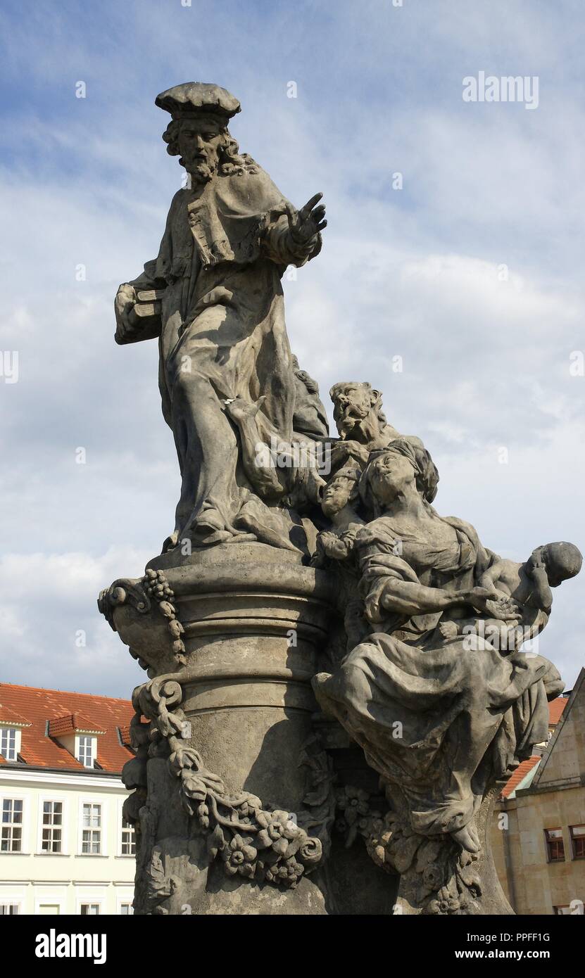 Saint Ivo of Kermartin, T.O.S.F. (1253-1303). Baroque sculpture by Matyas Bernard Braun on behalf of the Faculty of Law (1711). The statue on the bridge is a replica from 1908, designed by Frantis ek Hergesel, Jr. Decorates the Charles Bridge. Prague. Czech Republic. Stock Photo