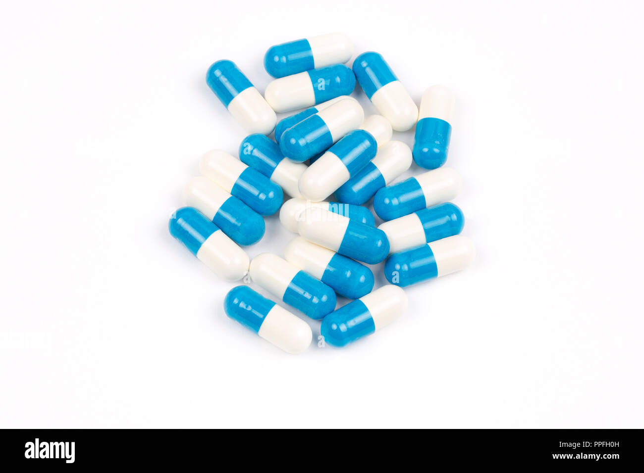 Capsules containing medicine Stock Photo