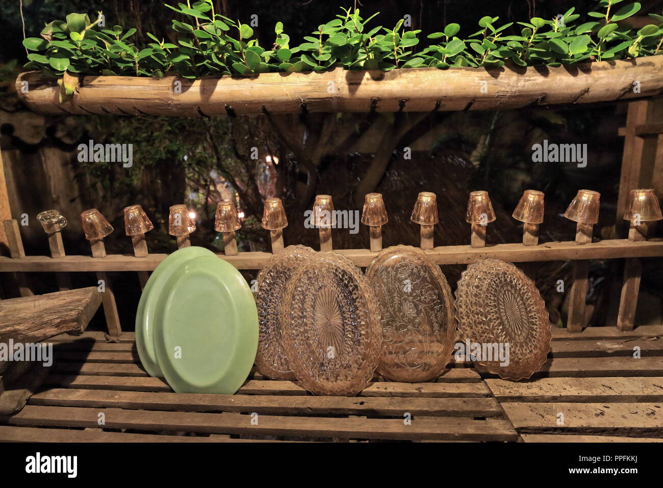 Rustic wooden dish drainer with glass and plastic tableware glasses drying on stacks of a Filipino ancestral house at the Mabini and Lopez Jaena stree Stock Photo Alamy