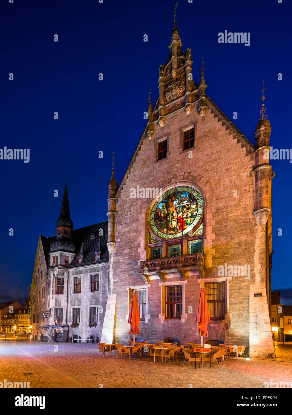 Renaissance Town Hall, window with enlightened stained glass, night scene, UNESCO World Heritage Site, Quedlinburg, Harz Stock Photo