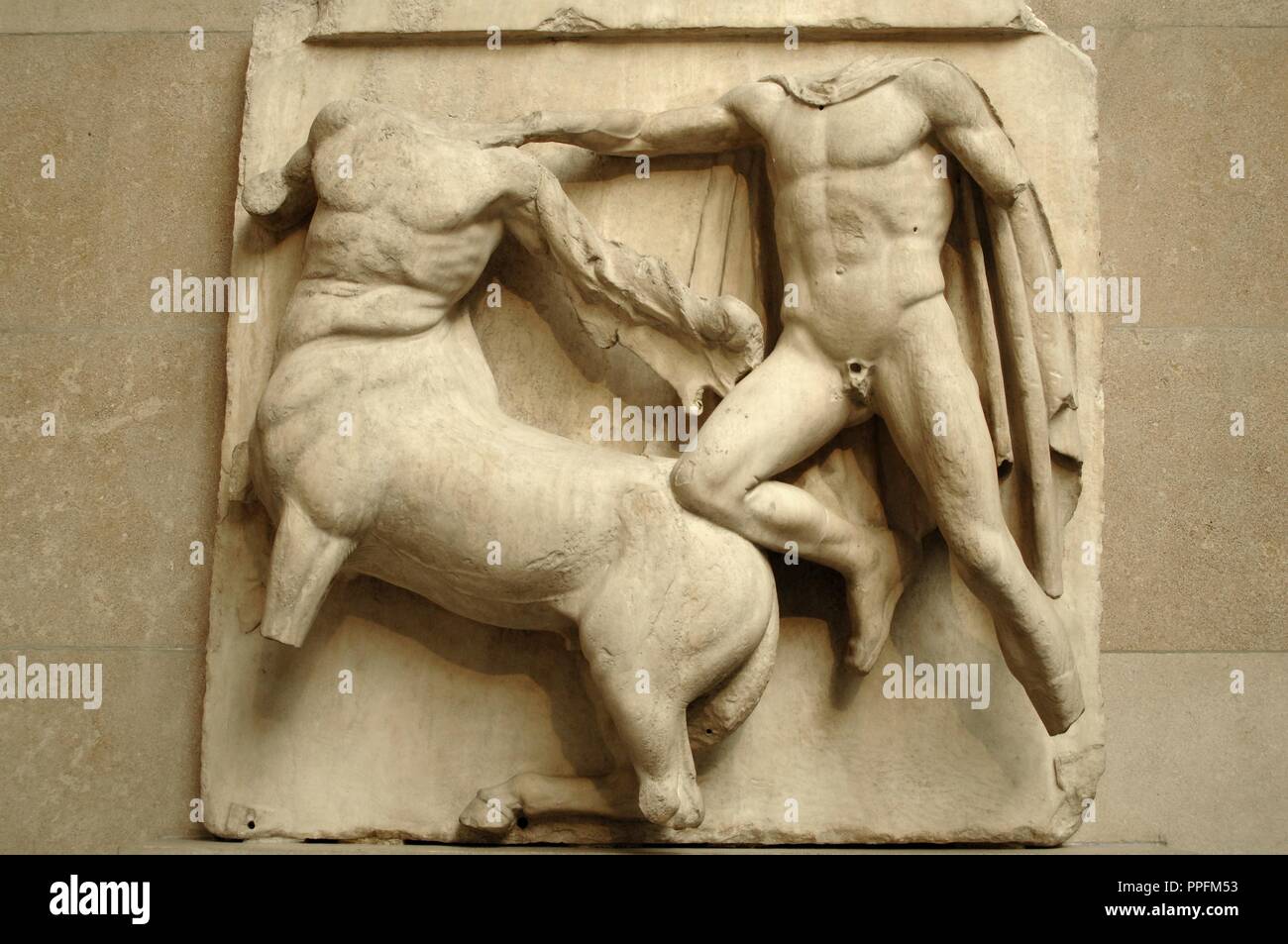 Metope III from the Parthenon marbles depicting part of the battle between the Centaurs and the Lapiths. 5th century BC. Athens. British Museum. London. United Kingdom. Stock Photo