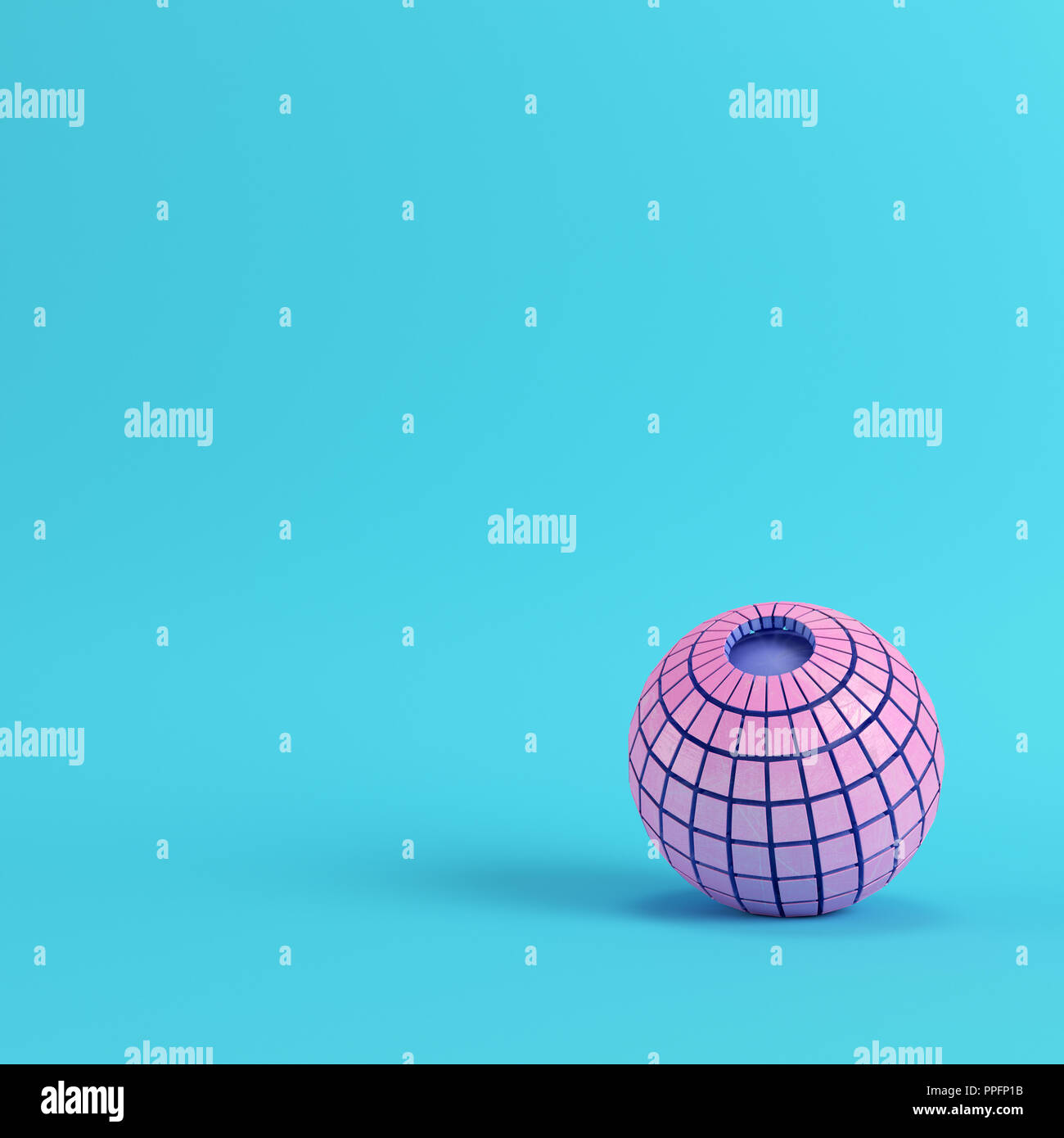 Abstract segmented pink sphere on bright blue background in pastel ...