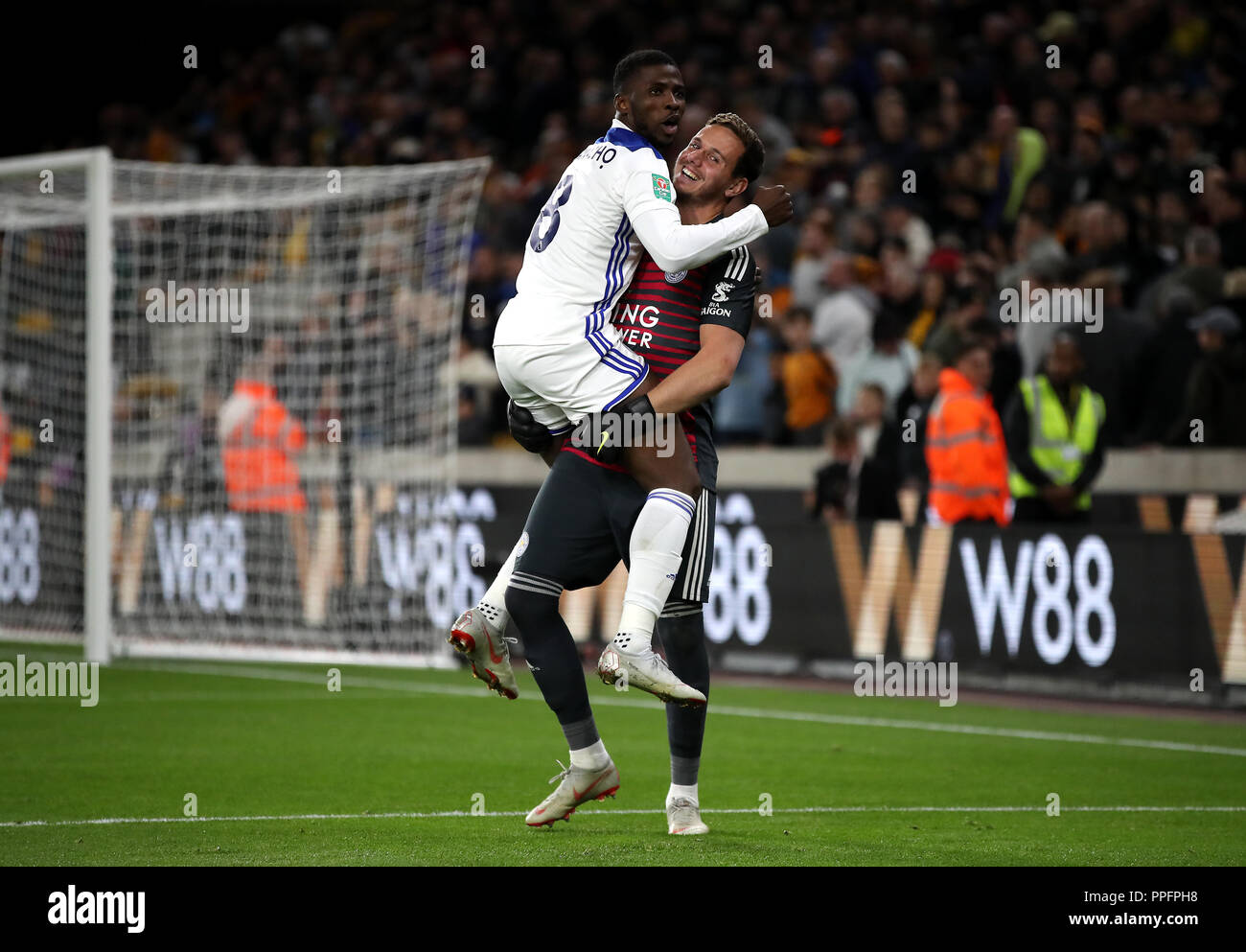 Leicester City goalkeeper Danny Ward (right) celebrates saving three penalties during the penalty shootout with team mate Kelechi Iheanacho (left) during the Carabao Cup, third round match at Molineux, Wolverhampton. PRESS ASSOCIATION Photo. Picture date: Tuesday September 25, 2018. See PA story SOCCER Wolves. Photo credit should read: Nick Potts/PA Wire. RESTRICTIONS: EDITORIAL USE ONLY No use with unauthorised audio, video, data, fixture lists, club/league logos or 'live' services. Online in-match use limited to 120 images, no video emulation. No use in betting, games or single club/league/p Stock Photo