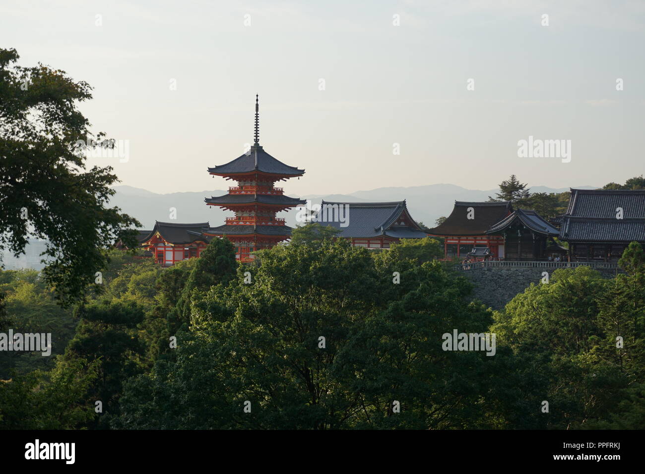 Kyoto, Japan - August 01, 2018: the halls and three storied pagoda of Kiyomizu-dera Buddhist Temple, a UNESCO World Cultural Heritage site, viewed fro Stock Photo