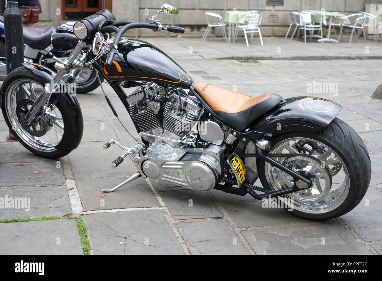 Harley Davidson Chopper parked at Market Place, Wells, Somerset, UK Stock Photo