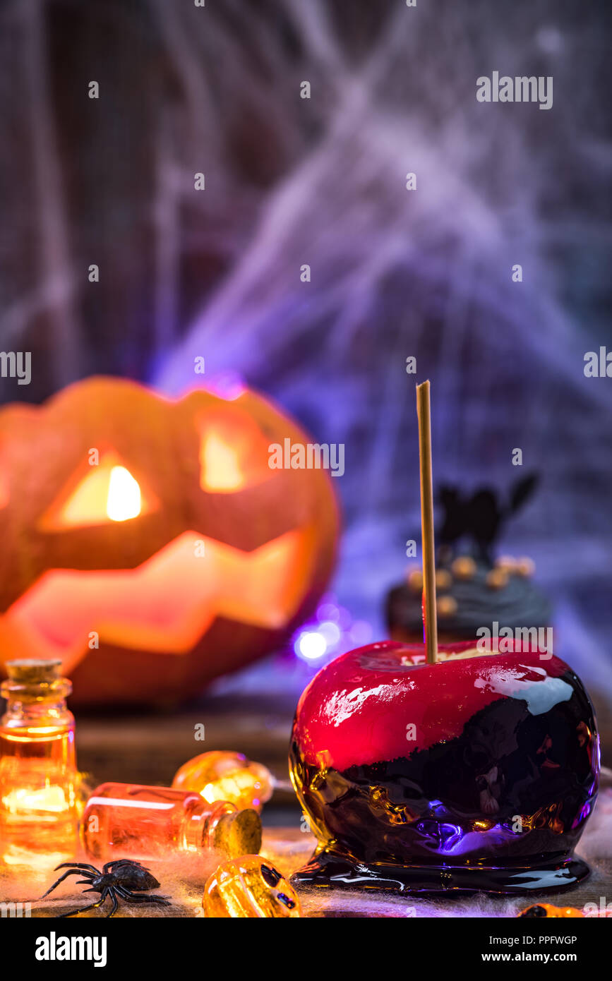 Candy apple, traditional Halloween food. Stock Photo