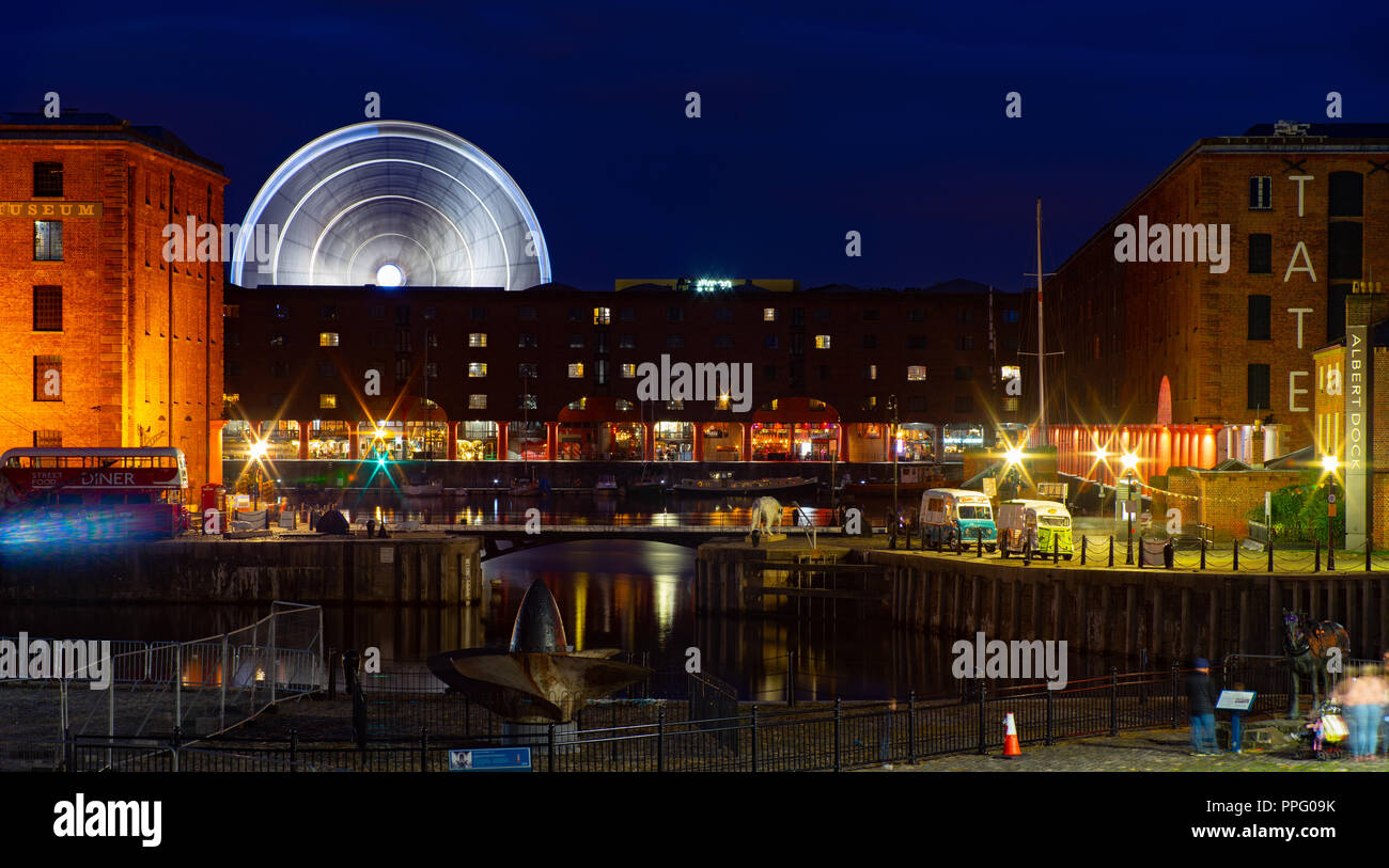 Albert Docks, Liverpool, with Ferris Wheel in motion, Maritime Museum. Image taken in September 2018. Stock Photo