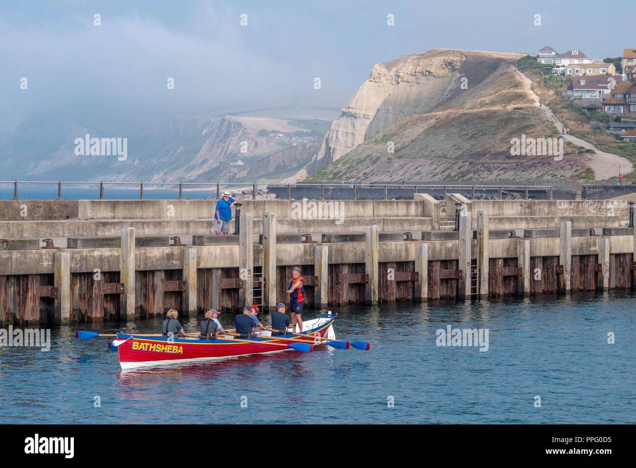 Gig boat Bathsheba pictured in Bridport Harbour, West Bay, Dorset, UK. Stock Photo