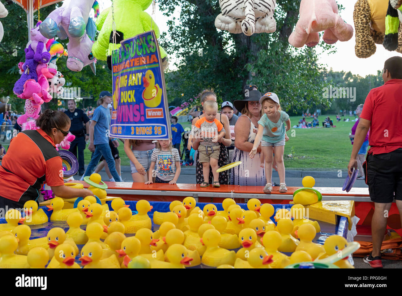 Wheat Ridge, Colorado A girl tries to win a prize during the annual