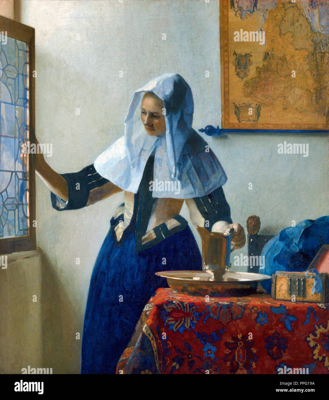Johannes Vermeer - Young Woman with a Water Pitcher. Circa 1662. Oil on canvas. Metropolitan Museum of Art, New York City, USA. Stock Photo