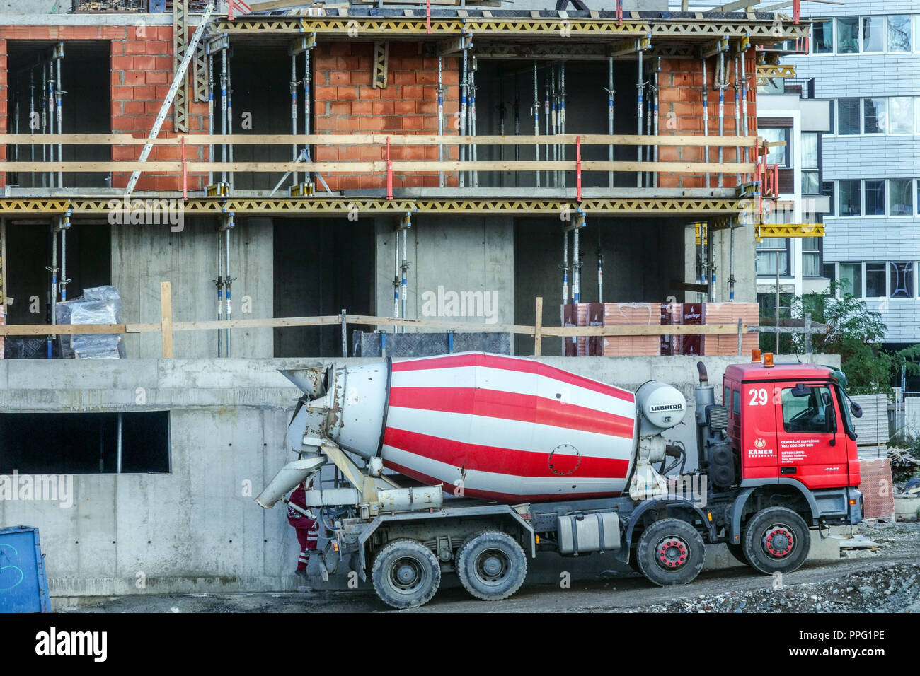 Newly built housing estate site, construction truck-mixer Prague, Czech Republic Truck Mixer Concrete Mix Machine Machinery Stock Photo