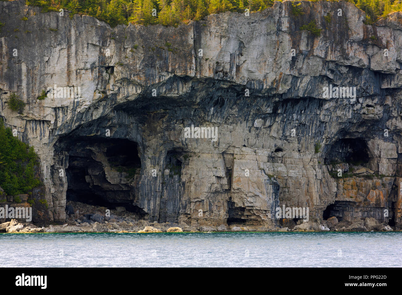 Limestone caves in the cliffs of the Bruce Peninsula, Georgian Bay Stock Photo