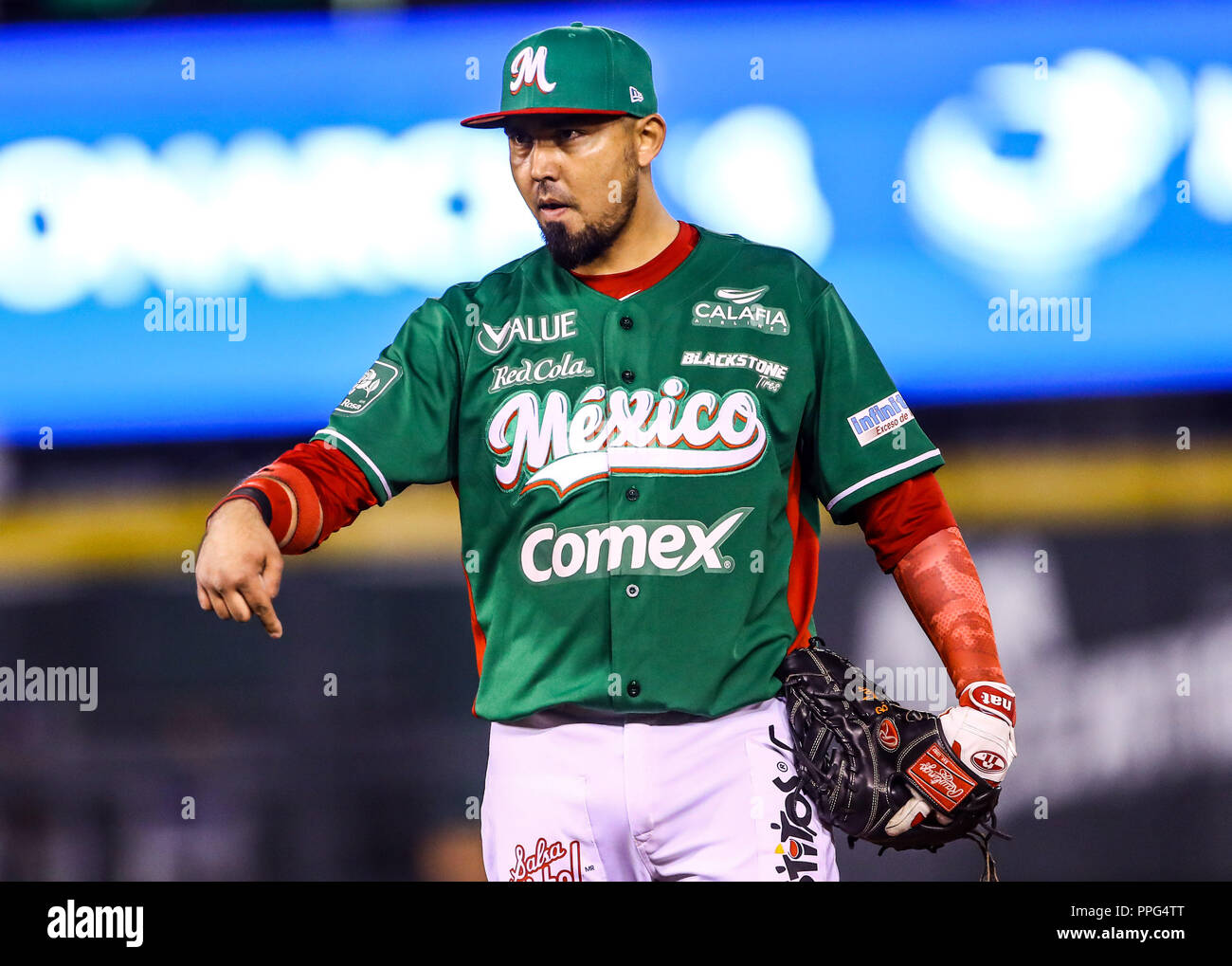 Actions of the Caribbean Series baseball game with the match of Tomateros  of Culiacan de Mexico against the Criollos de Caguas of Puerto Rico in  baseb Stock Photo - Alamy