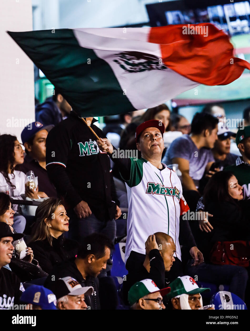 Bandera de Mexico.   Acciones, durante el partido de beisbol de la Serie del Caribe con el encuentro entre Tomateros de Culiacan de Mexico contra los  Stock Photo