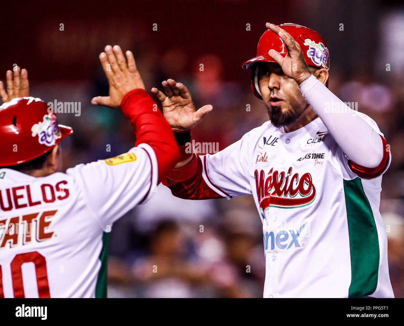 Acciones, durante el partido de beisbol de la Serie del Caribe con el encuentro entre Tomateros de Culiacan de Mexico contra los Caribes de Anzoátegui Stock Photo