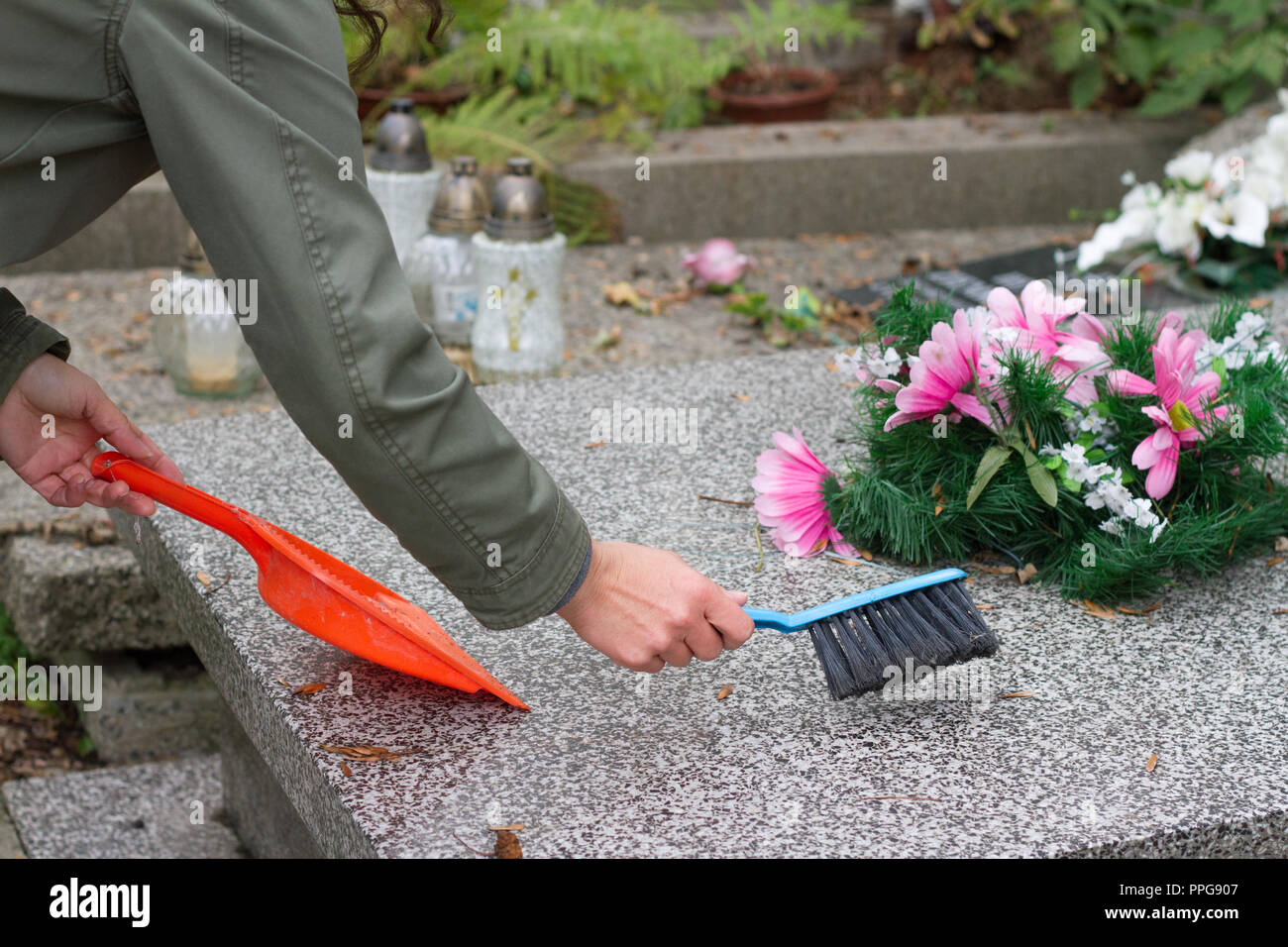 Grave Sweeping High Resolution Stock Photography and Images Alamy