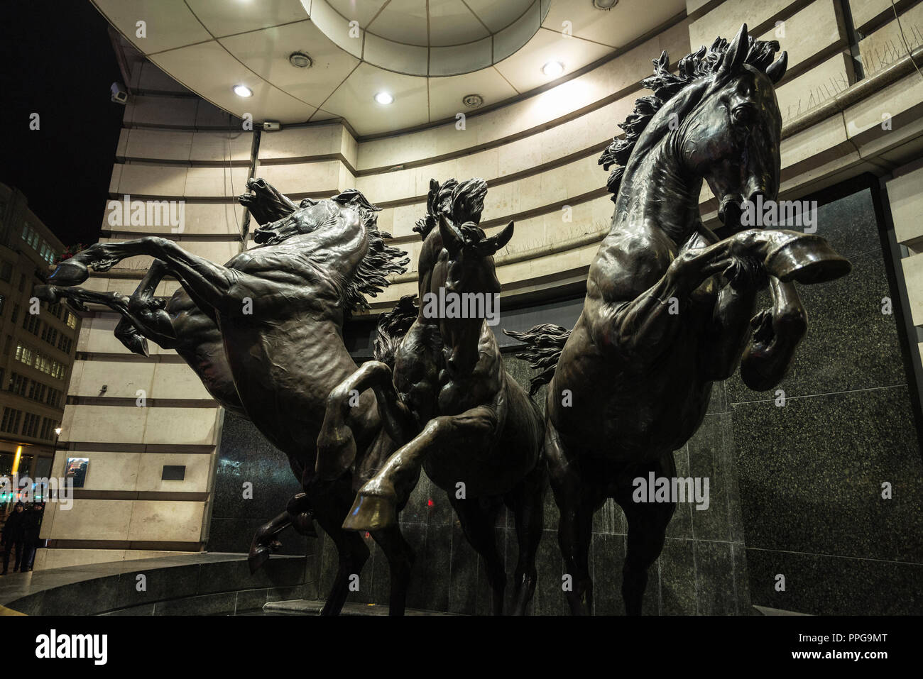 London, United Kingdom - January 3, 2018: The Horses of Helios, also known as The Four Bronze Horses of Helios, is an outdoor bronze sculpture by Rudy Stock Photo