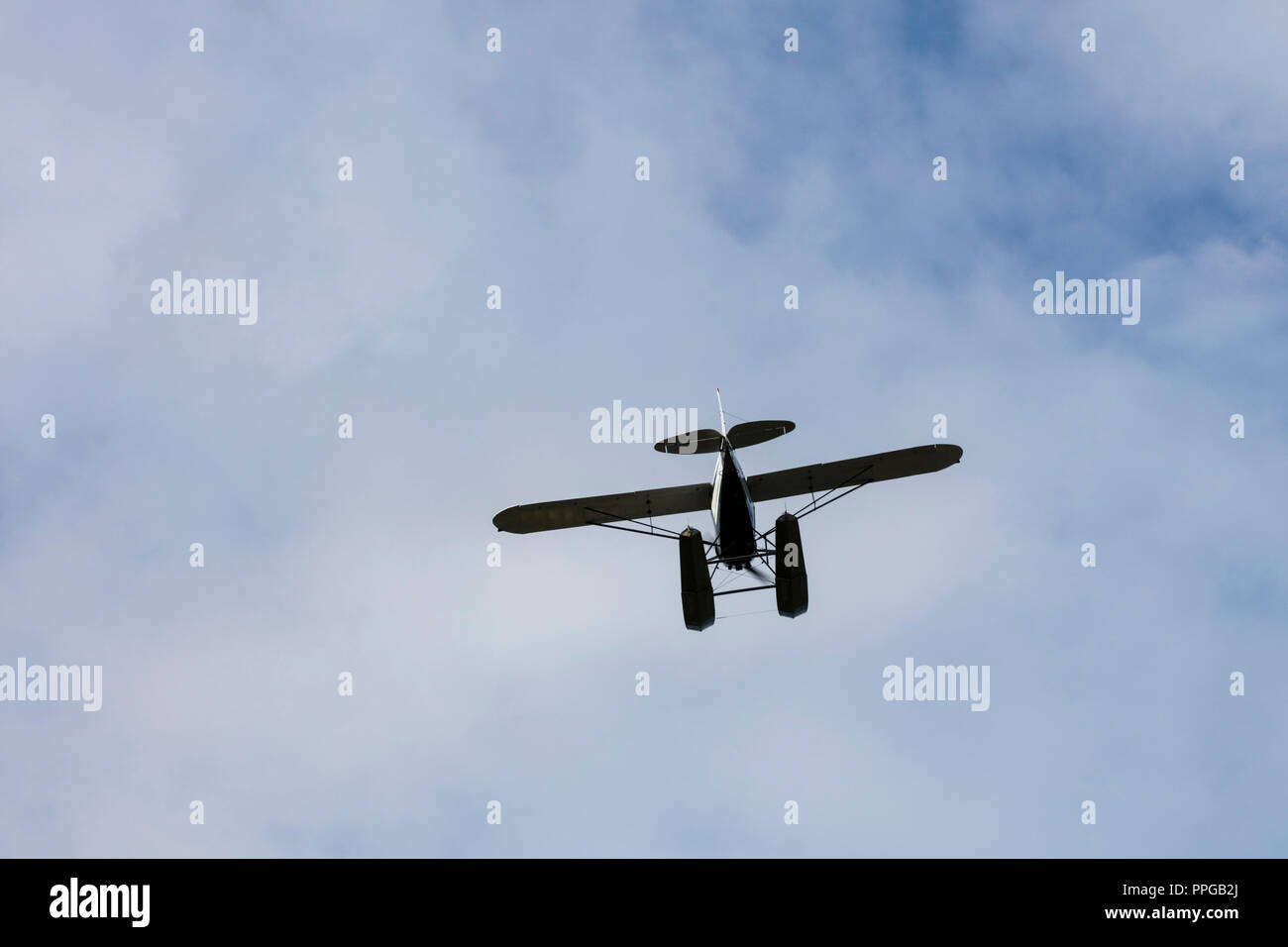 Seaplane Or Floatplane Flying In Sky Overhead Stock Photo Alamy