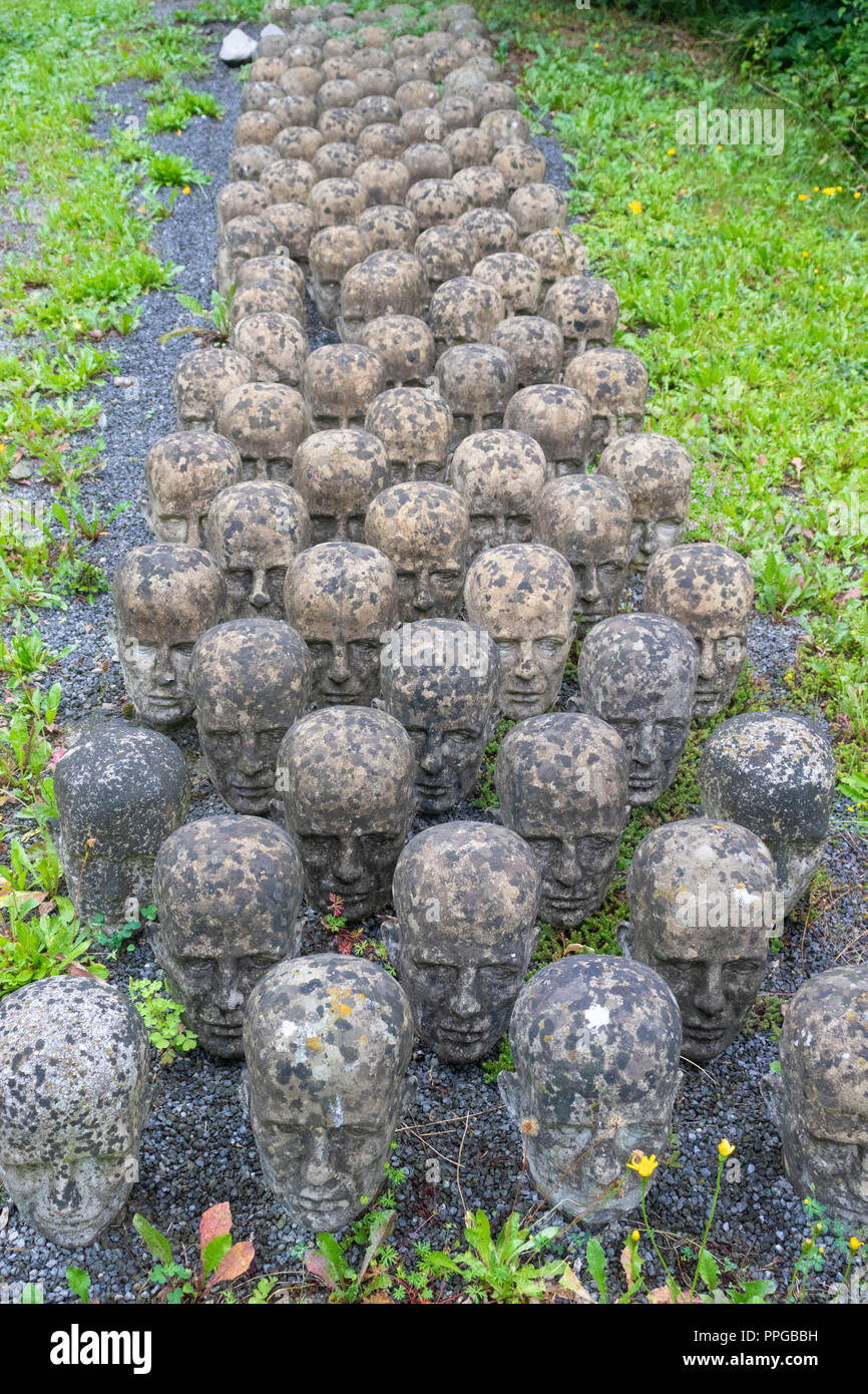 Holocaust Memorial of Rows of Heads on the way to Mauthausen Concentration Camp Austria. Stock Photo