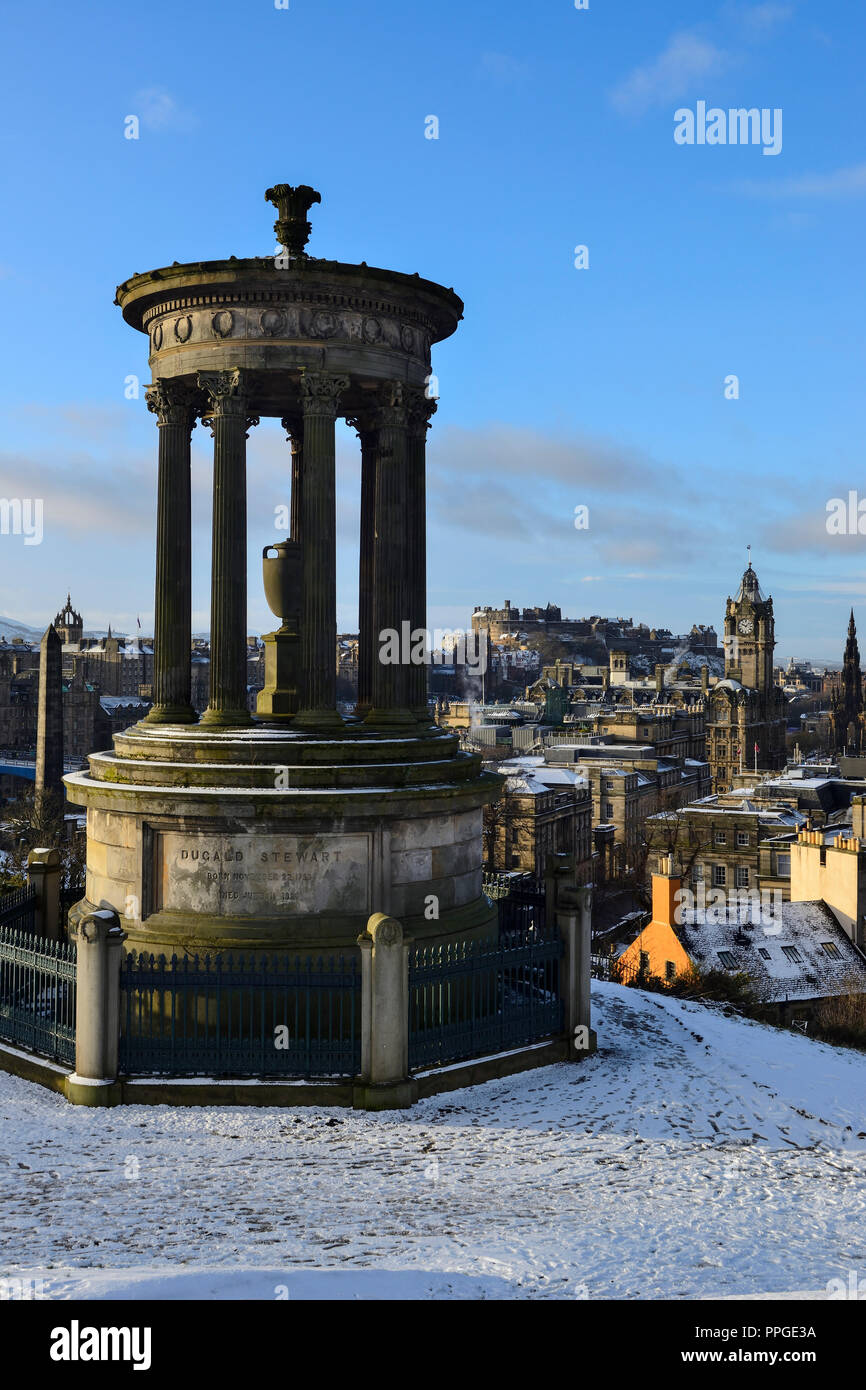 Dugald Stewart Monument, Balmoral Hotel clocktower and city skyline from Calton Hill, Edinburgh, Scotland Stock Photo