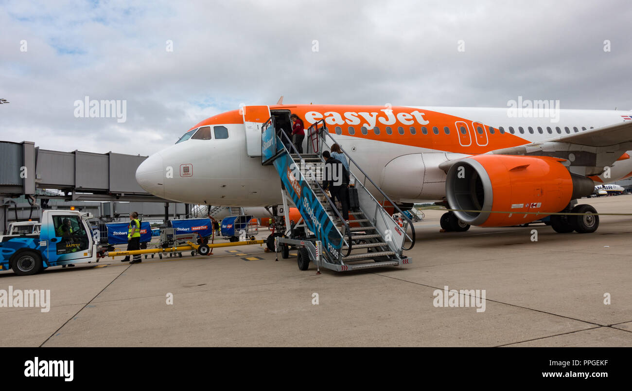 Easyjet airliner at loading gate. Stanstead Airport, UK Stock Photo