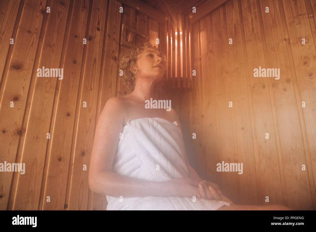 Woman relaxing in steam bath hires stock photography and images Alamy