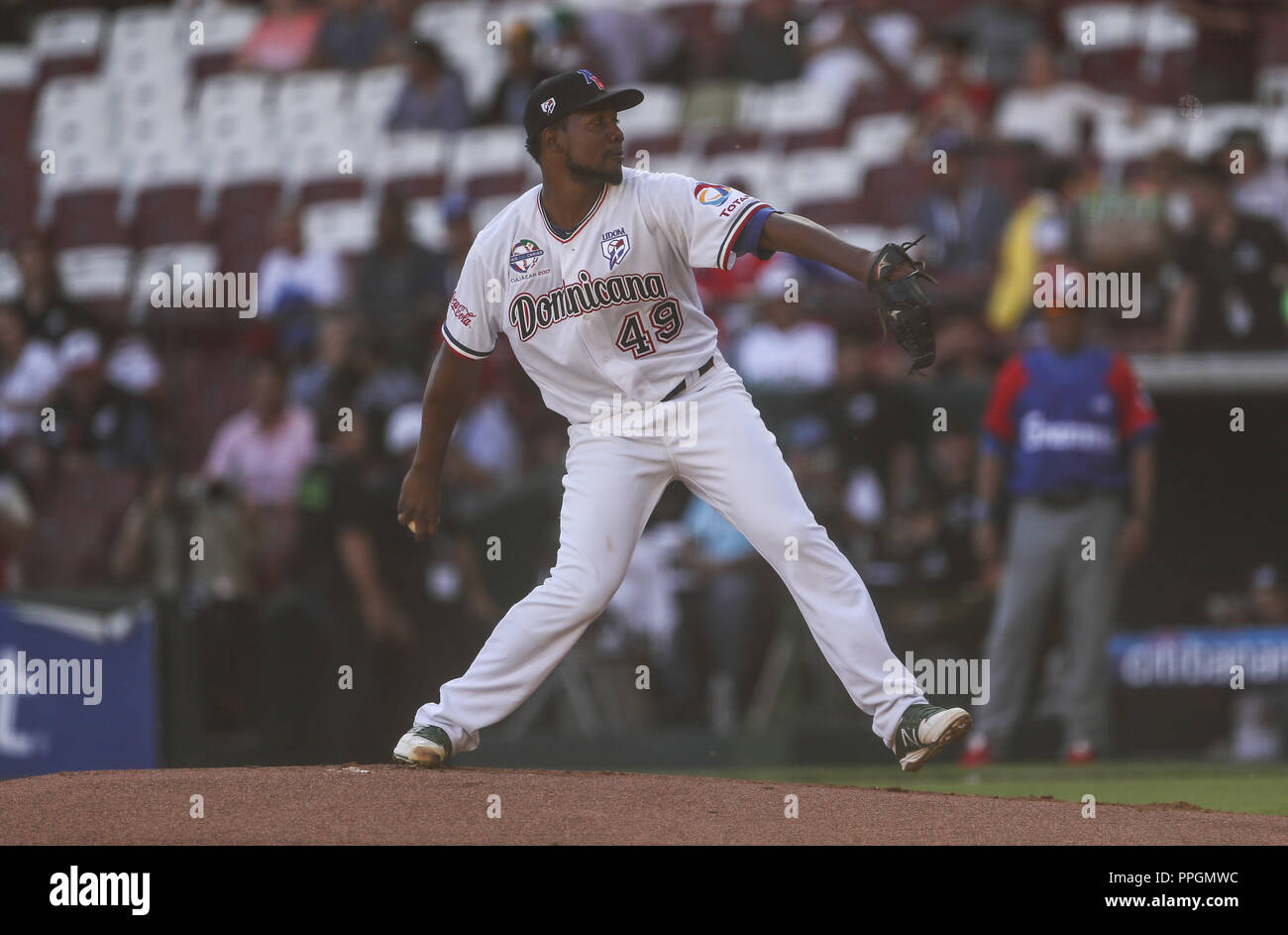 Initial pitcher of Tigres del Licey of Dominican Republic, Lázaro Blanco makes a pitch in the first inning, During the baseball game for the Caribb Stock Photo