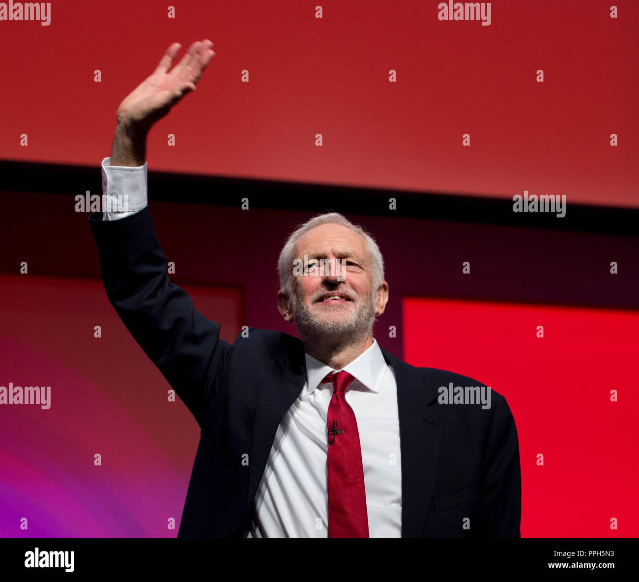 Liverpool, UK. 26th September 2018. Jeremy Corbyn, Leader of the Opposition, Leader of the Labour Party and Labour MP for Islington North, waves to delegate at the Labour Party Conference in Liverpool. © Russell Hart/Alamy Live News. Stock Photo