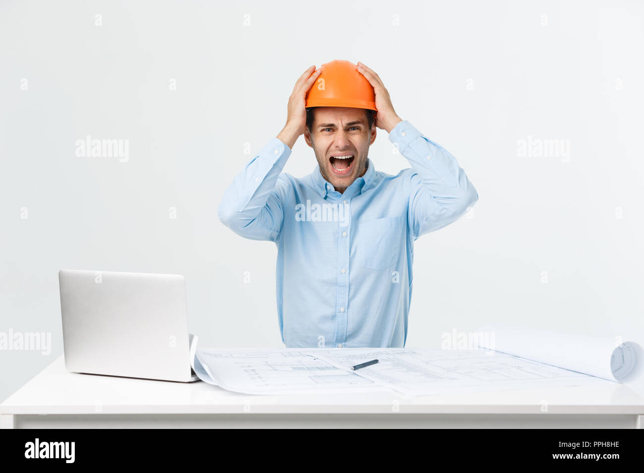 Face stressed young man construction hi-res stock photography and ...