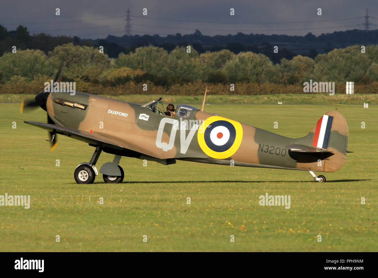 The Imperial War Museums Supermarine Spitfire Mk 1 taxiing in at Duxford following the September air show. Stock Photo