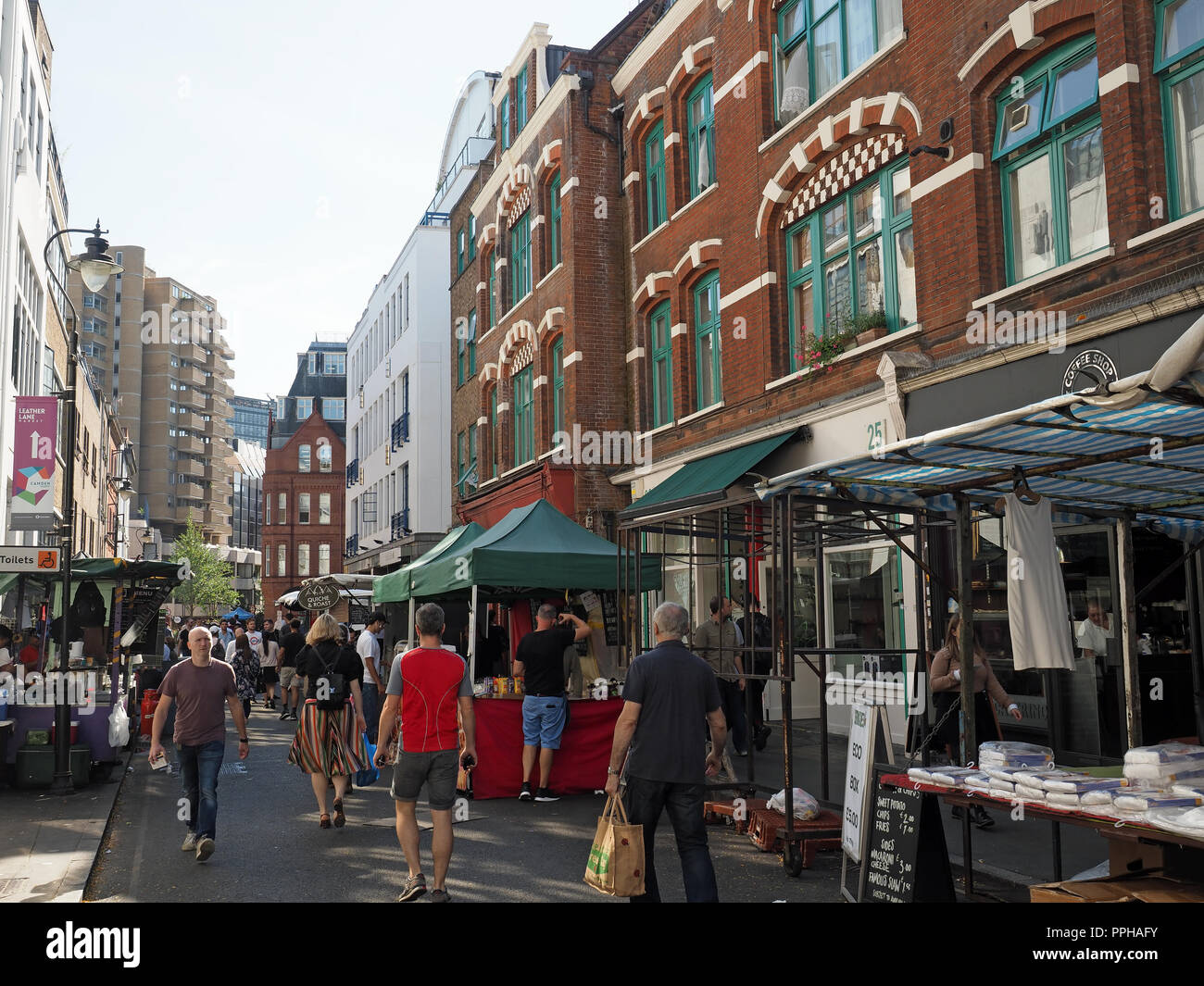 View along the street market and food stalls in Leather Lane London Stock Photo
