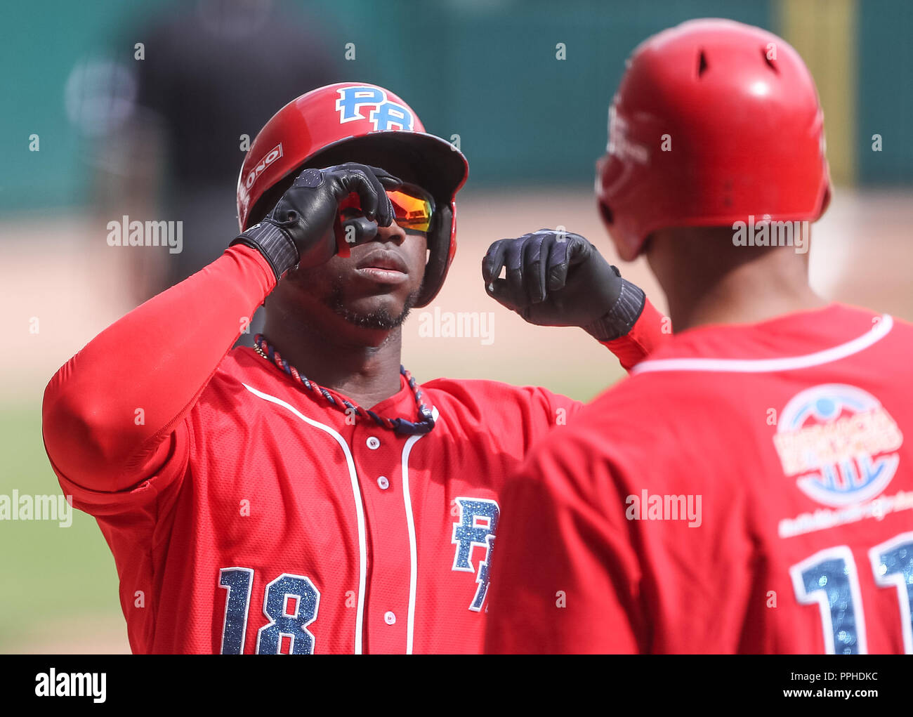 Rusney Castillo de Puerto Rico celebra carrera, durante el partido de beisbol de la Serie del Caribe entre Republica Dominicana vs Puerto Rico en el N Stock Photo